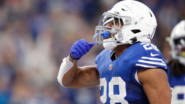 Indianapolis Colts running back Jonathan Taylor (28) celebrates after a fourth quarter touchdown Sunday, Nov. 28, 2021, during a game against the Tampa Bay Buccaneers at Lucas Oil Stadium in Indianapolis.